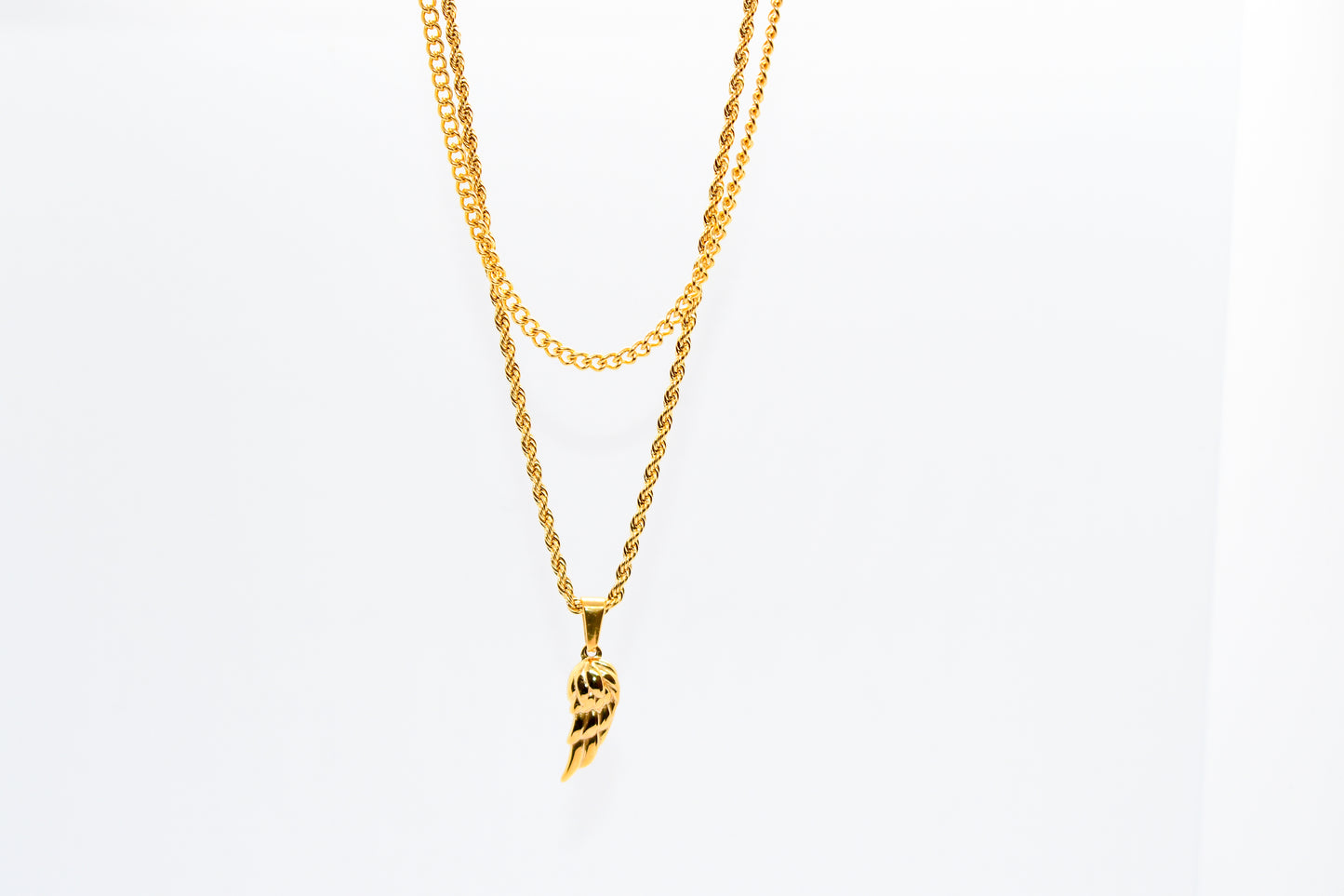 GOLD LAYERED FEATHER NECKLACE