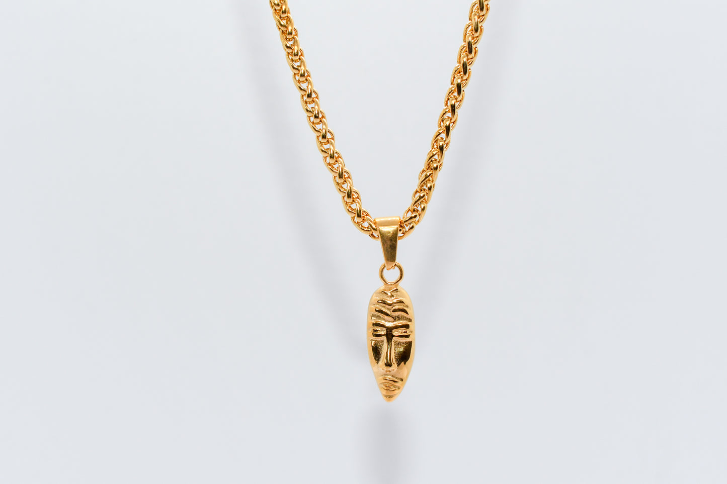 GOLD MASQUERADE PENDANT WITH WHEAT CHAIN