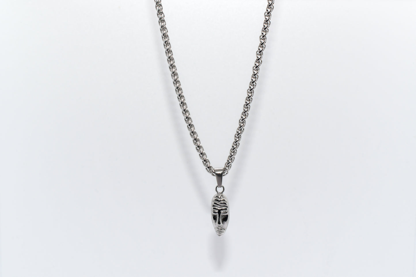 SILVER MASQUERADE PENDANT WITH WHEAT CHAIN