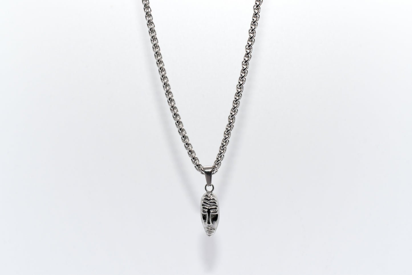 SILVER MASQUERADE PENDANT WITH WHEAT CHAIN